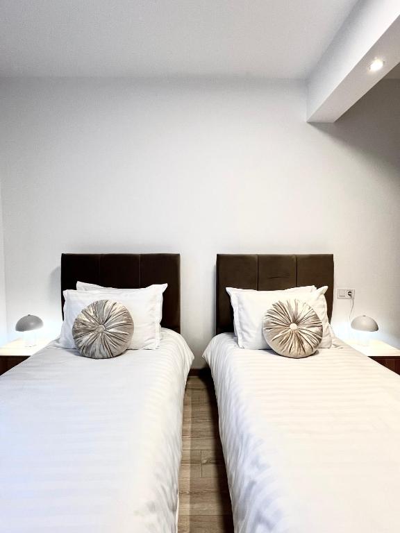 Postel nebo postele na pokoji v ubytování Riverside ApartHotel by InnTime