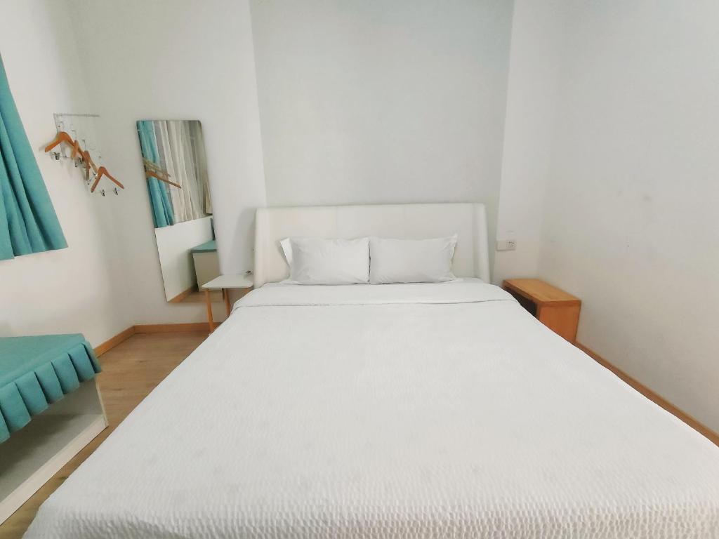Postel nebo postele na pokoji v ubytování A&G Apartment