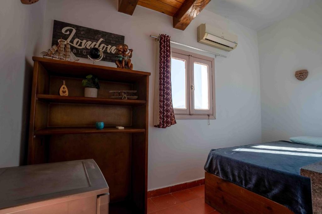 Postel nebo postele na pokoji v ubytování Elomda Seaview