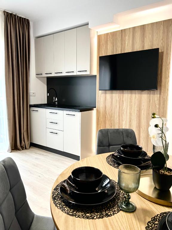 Kuchyň nebo kuchyňský kout v ubytování Riverside ApartHotel by InnTime