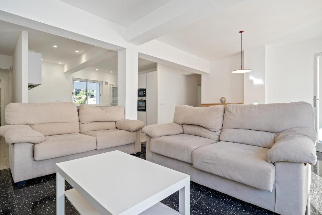 Posedenie v ubytovaní Hauzify I Apartament Riera