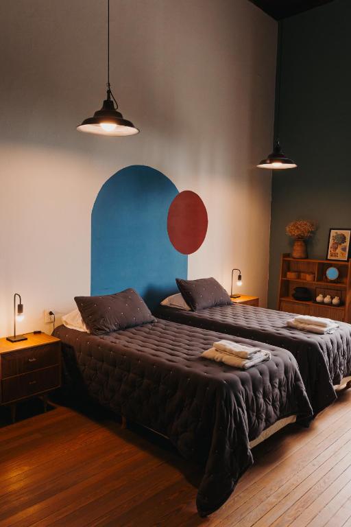Postel nebo postele na pokoji v ubytování Dia 32 Guest House