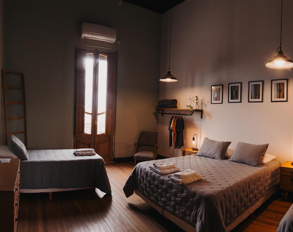 Postel nebo postele na pokoji v ubytování Dia 32 Guest House