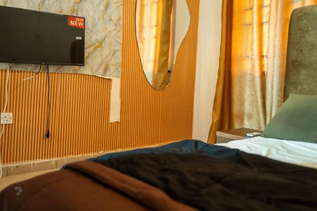 TV a/nebo společenská místnost v ubytování 2-3 Bed Apt with Pool Wi-fi,24hrs Power,ps4