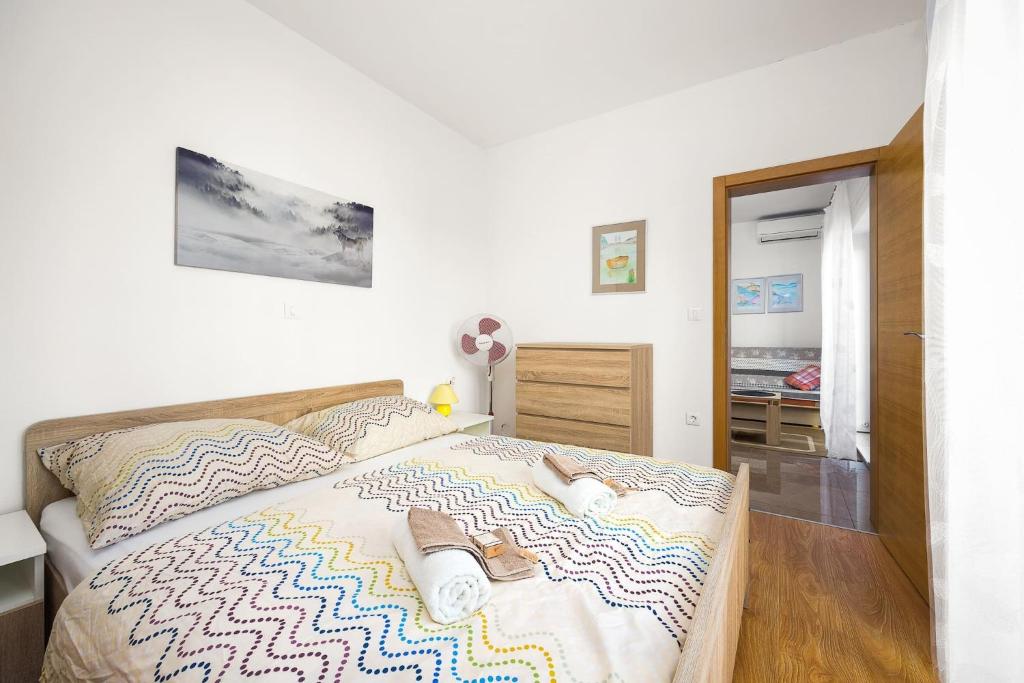 Postel nebo postele na pokoji v ubytování Apartment Tania