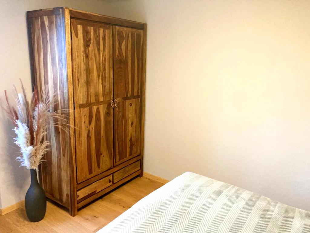 Postel nebo postele na pokoji v ubytování Woidgeist FeWos - Aktiv- und Familienurlaub in der Dreisesselregion D-A-CZ