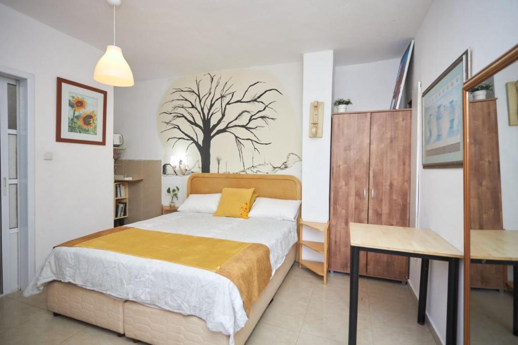 Postel nebo postele na pokoji v ubytování Beatrice Hospitality