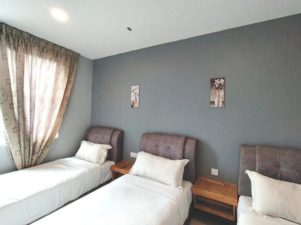 Katil atau katil-katil dalam bilik di G9 Hotel Alor Setar