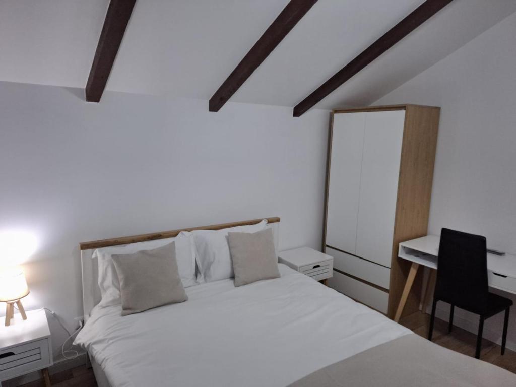Postel nebo postele na pokoji v ubytování Casa Dora