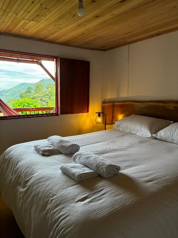 Postel nebo postele na pokoji v ubytování Finca La Macarena by Welttisch