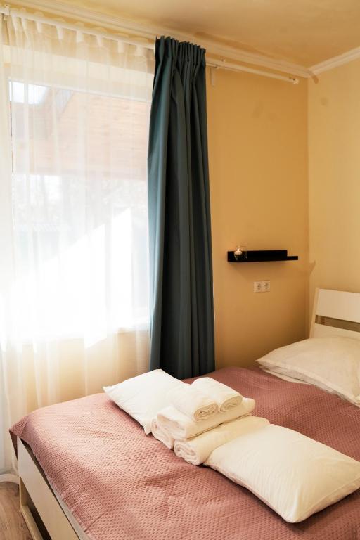 Nyugágy Apartman客房内的一张或多张床位