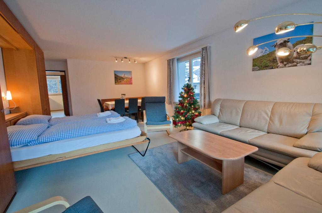 Postel nebo postele na pokoji v ubytování Haus Matten, Apartment Birch