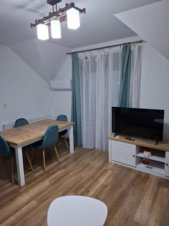 TV a/nebo společenská místnost v ubytování Casa Dora