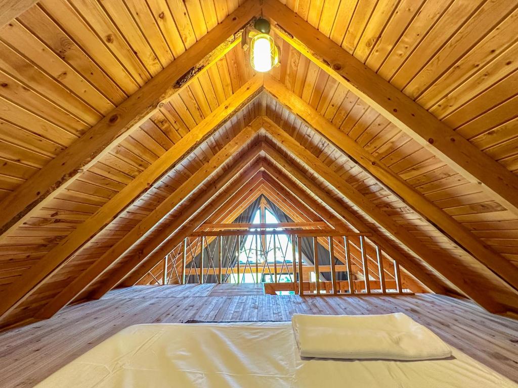 Postel nebo postele na pokoji v ubytování Kaş Konak Bungalows