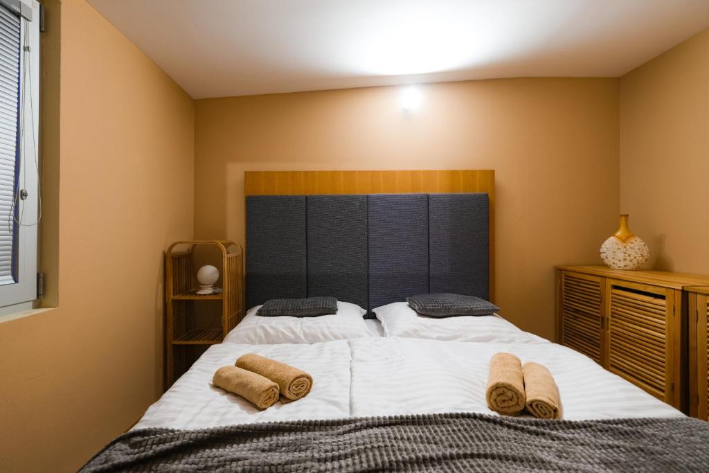 Postel nebo postele na pokoji v ubytování Dovolenkový dom Nad hladinou