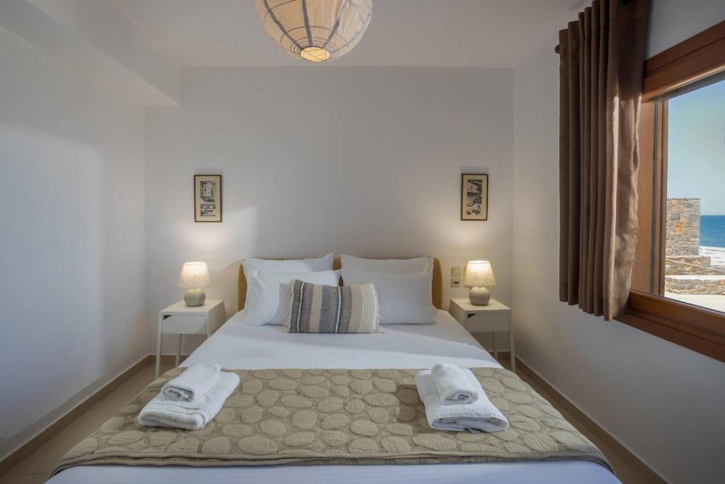 Postel nebo postele na pokoji v ubytování Ascuri Apartment