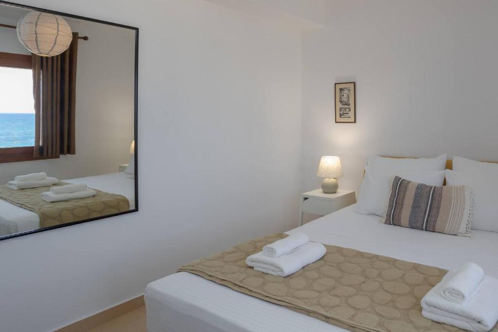 Postel nebo postele na pokoji v ubytování Ascuri Apartment
