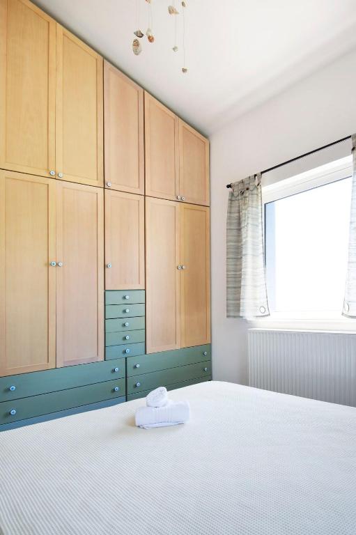 Postel nebo postele na pokoji v ubytování Blue Dream Seaside Villa with superb sea views