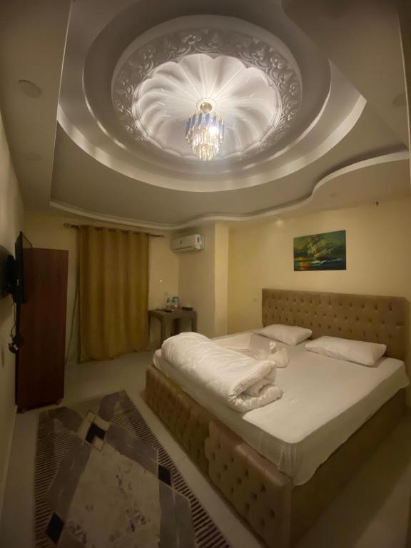 Postel nebo postele na pokoji v ubytování Pyramids International INN