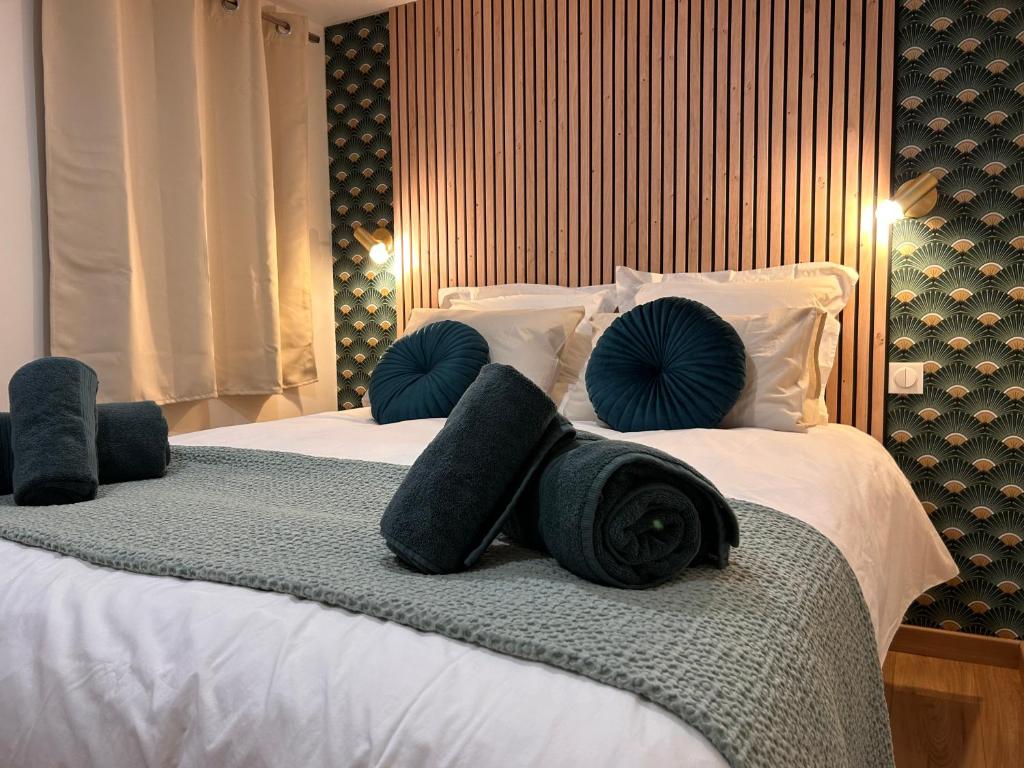 Ένα ή περισσότερα κρεβάτια σε δωμάτιο στο Logement moderne, luxueux, Hyper centre