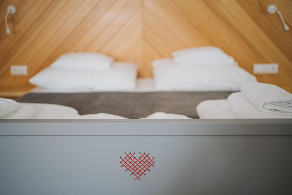 Posteľ alebo postele v izbe v ubytovaní Tornácos Hotel - Hegykő