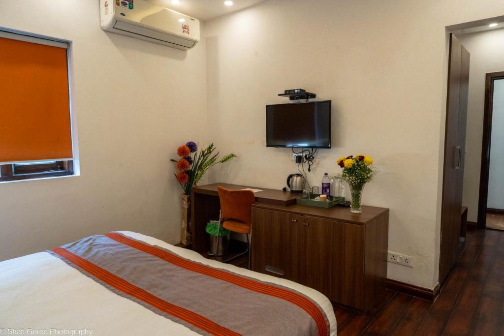 TV a/nebo společenská místnost v ubytování Orania B & B by Atsar