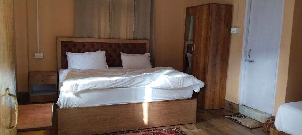 Letto o letti in una camera di Mandavya homestay