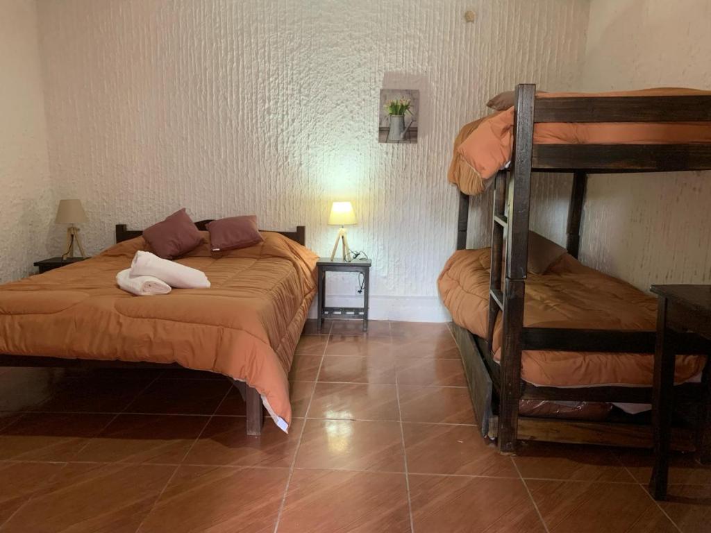 Postel nebo postele na pokoji v ubytování Hotel Mesón Do Vento