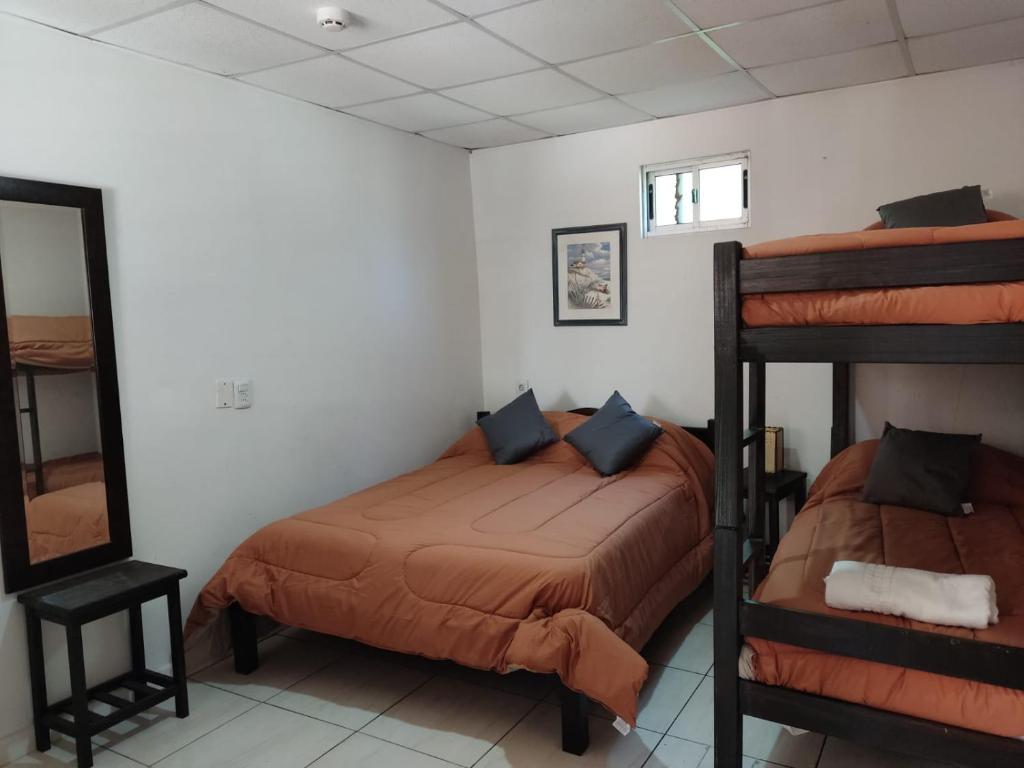Postel nebo postele na pokoji v ubytování Hotel Mesón Do Vento