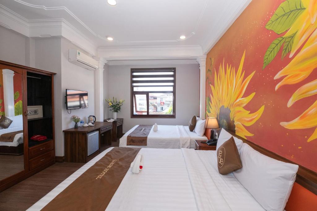 Postel nebo postele na pokoji v ubytování Jade Hotel