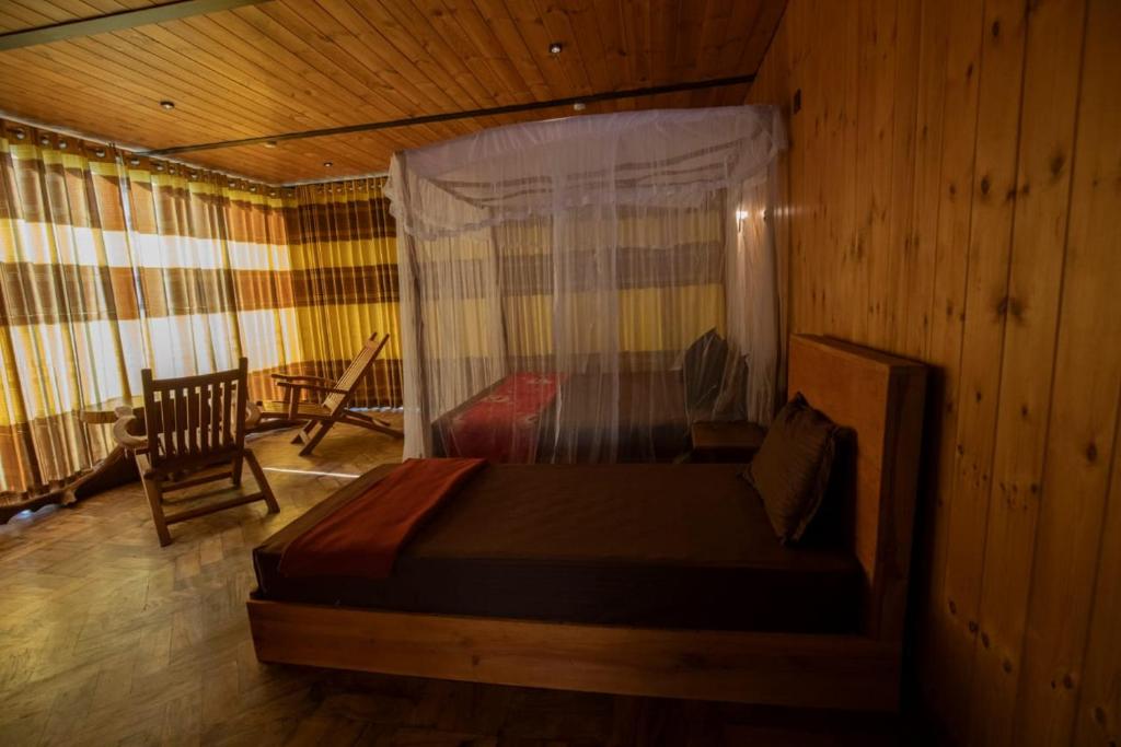 Postel nebo postele na pokoji v ubytování Ella Camelot