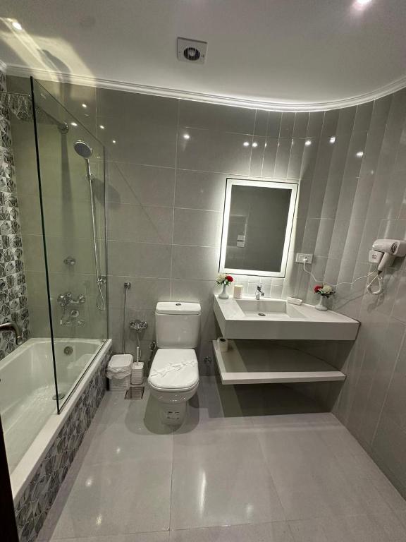 Koupelna v ubytování Sama hotel