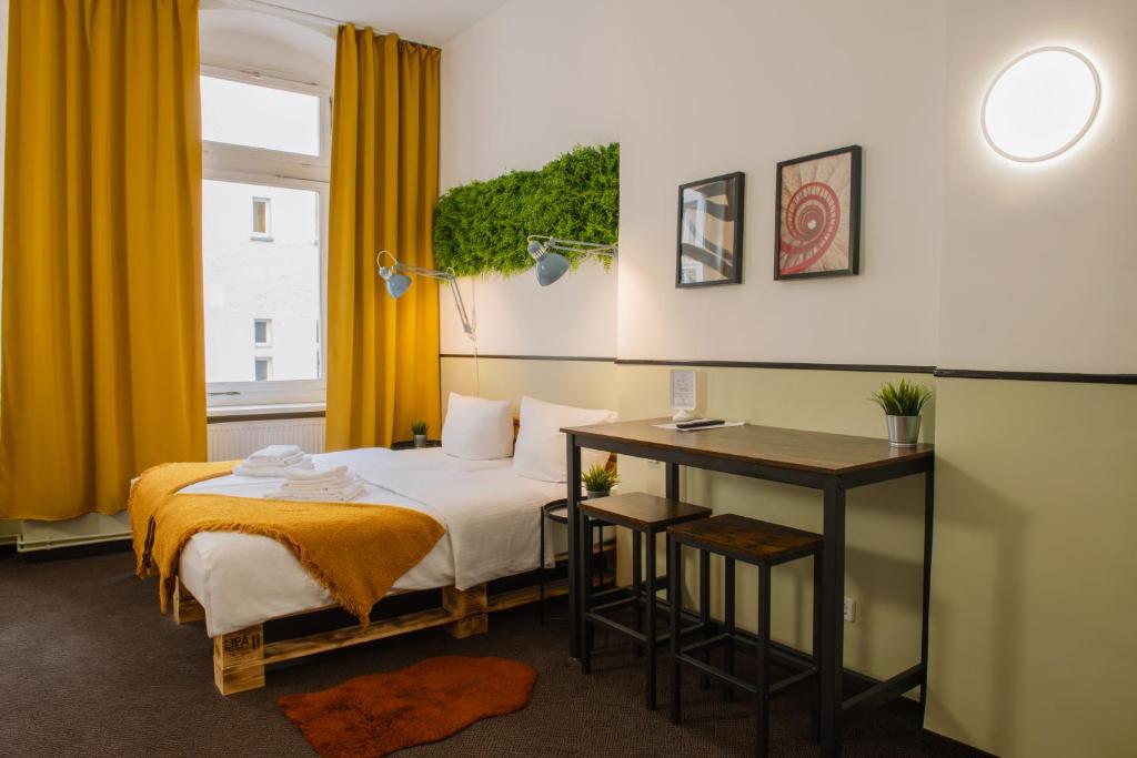 Postel nebo postele na pokoji v ubytování Hotel Alex Berlin