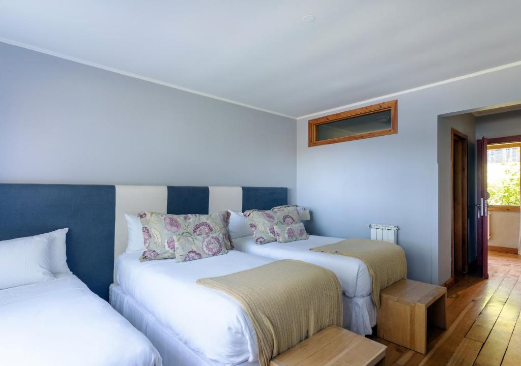 Postel nebo postele na pokoji v ubytování La Escondida Casa De Huespedes & Spa