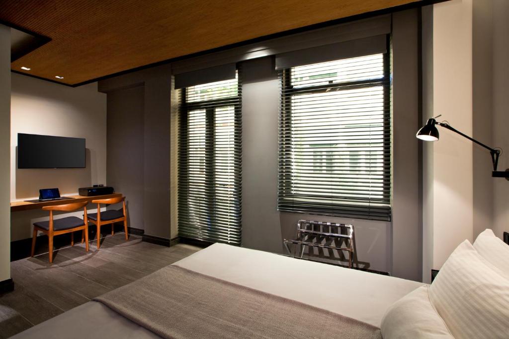Postel nebo postele na pokoji v ubytování MET34 Athens