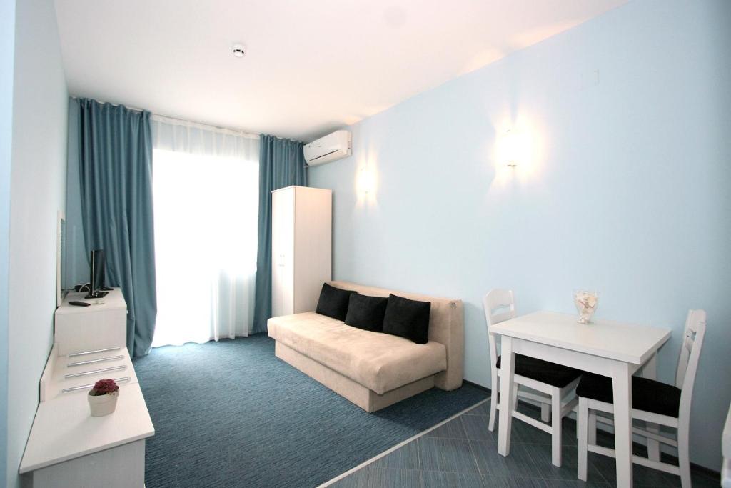 A seating area at Sunny Beauty Palace Hotel