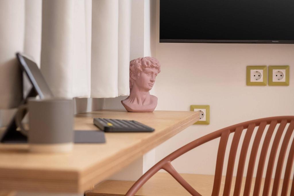 TV a/nebo společenská místnost v ubytování Sleep On It