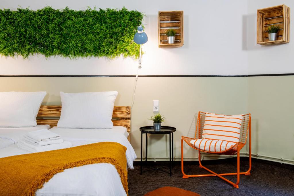 Postel nebo postele na pokoji v ubytování Hotel Alex Berlin
