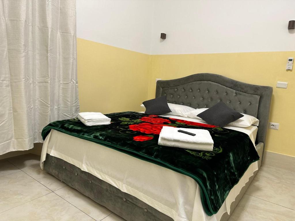 Postel nebo postele na pokoji v ubytování TURATI TERMINi