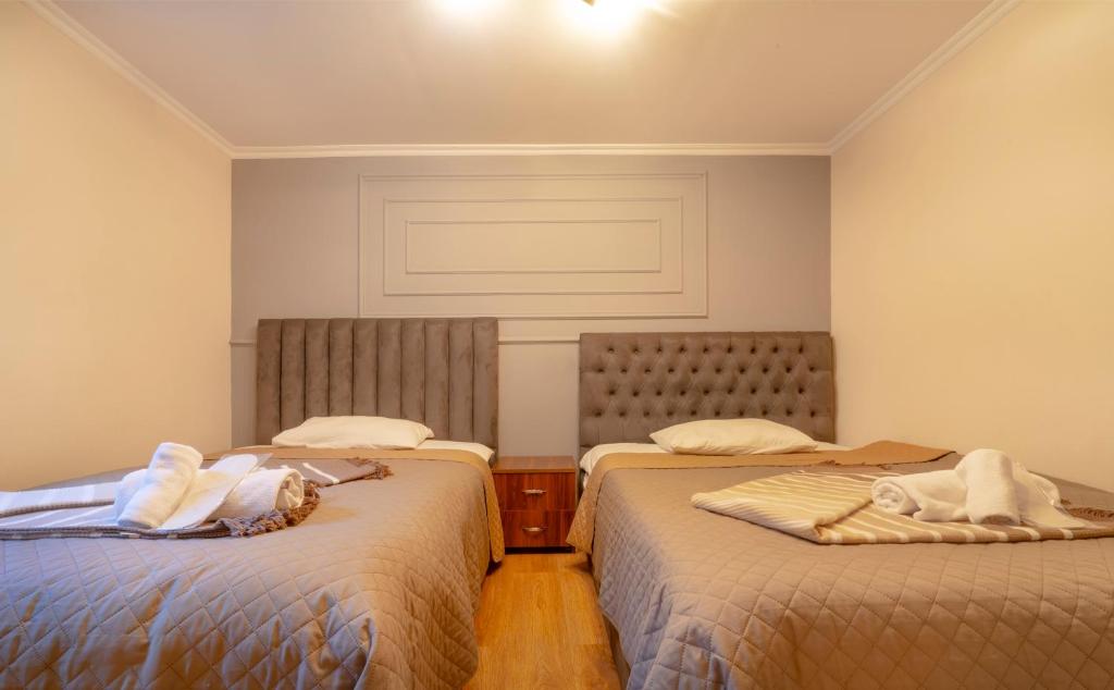 Postel nebo postele na pokoji v ubytování 4Season Villa