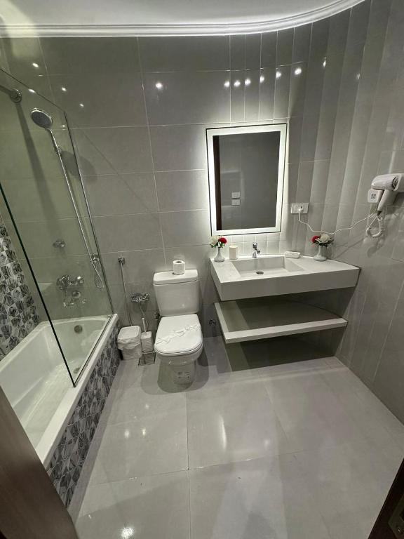 Koupelna v ubytování Sama hotel