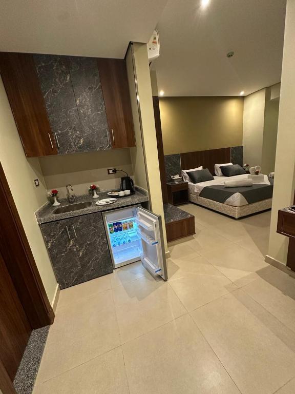 Postel nebo postele na pokoji v ubytování Sama hotel