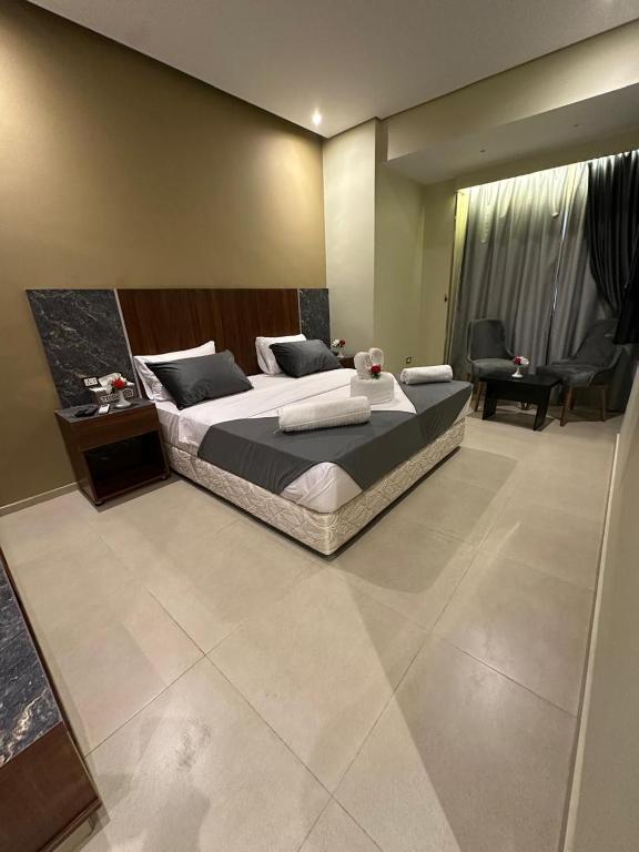 Postel nebo postele na pokoji v ubytování Sama hotel