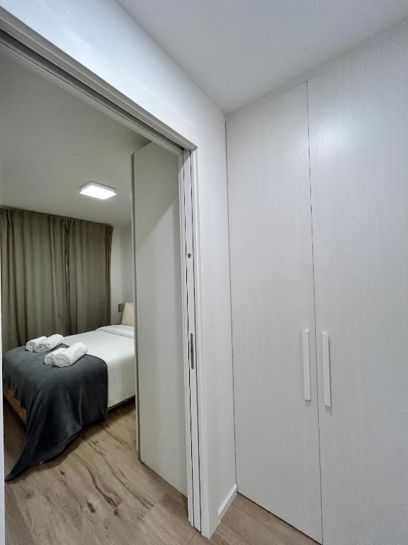 Postel nebo postele na pokoji v ubytování Camelia's Home Andalo