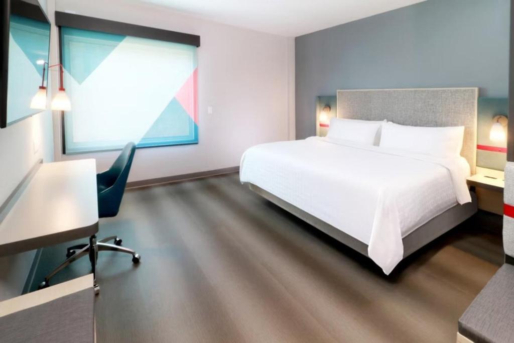 Postel nebo postele na pokoji v ubytování Avid Hotel Querétaro Centro Sur by IHG