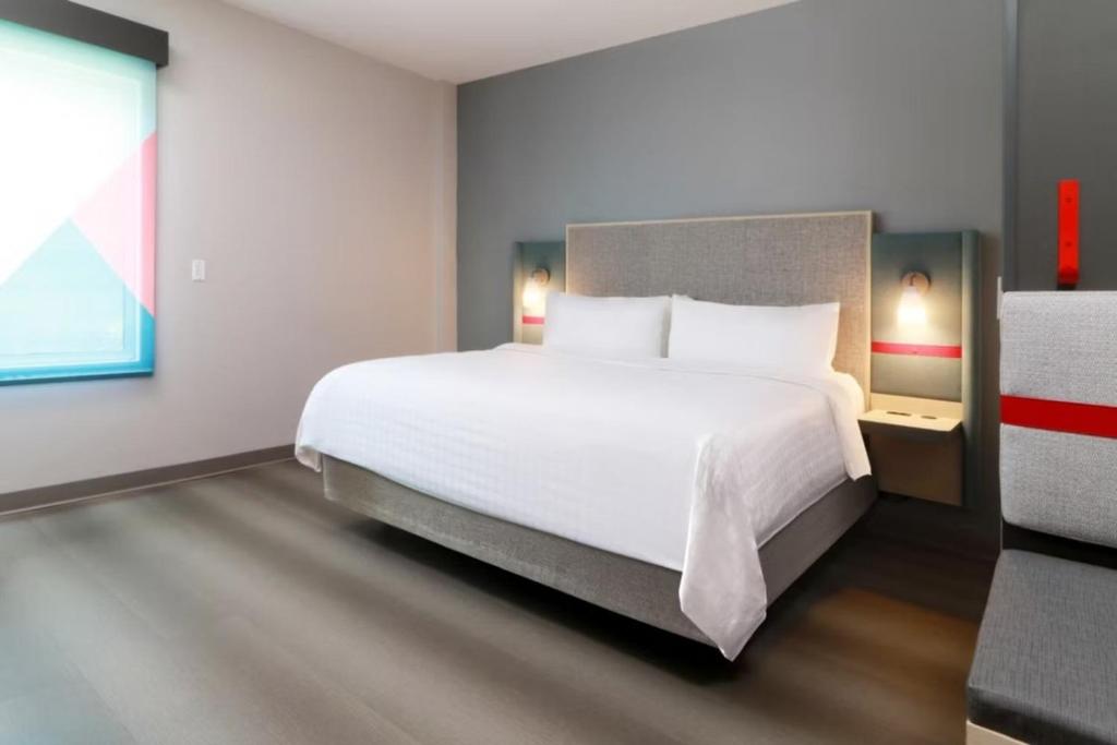Postel nebo postele na pokoji v ubytování Avid Hotel Querétaro Centro Sur by IHG
