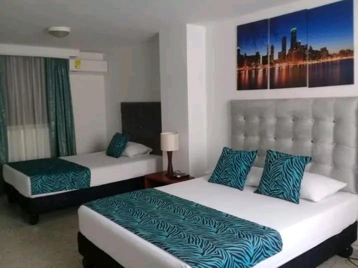 Postel nebo postele na pokoji v ubytování Varzalojate Torre de Granada