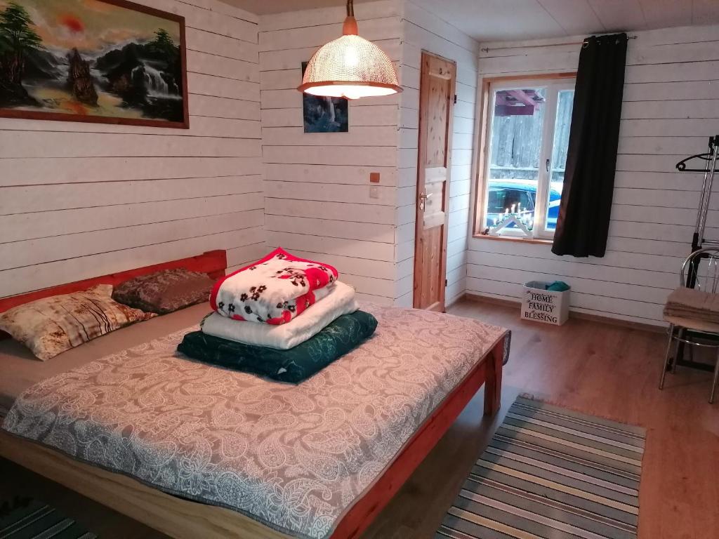 Postel nebo postele na pokoji v ubytování Sillavahi maja