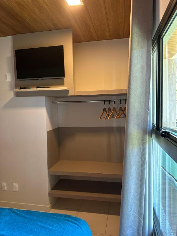 TV a/nebo společenská místnost v ubytování Ilheus North Hotel