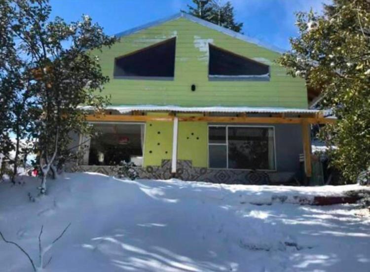 Cabaña Rodar om vinteren